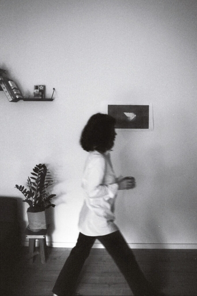 female entrepreneur walking in her web and brand design studio